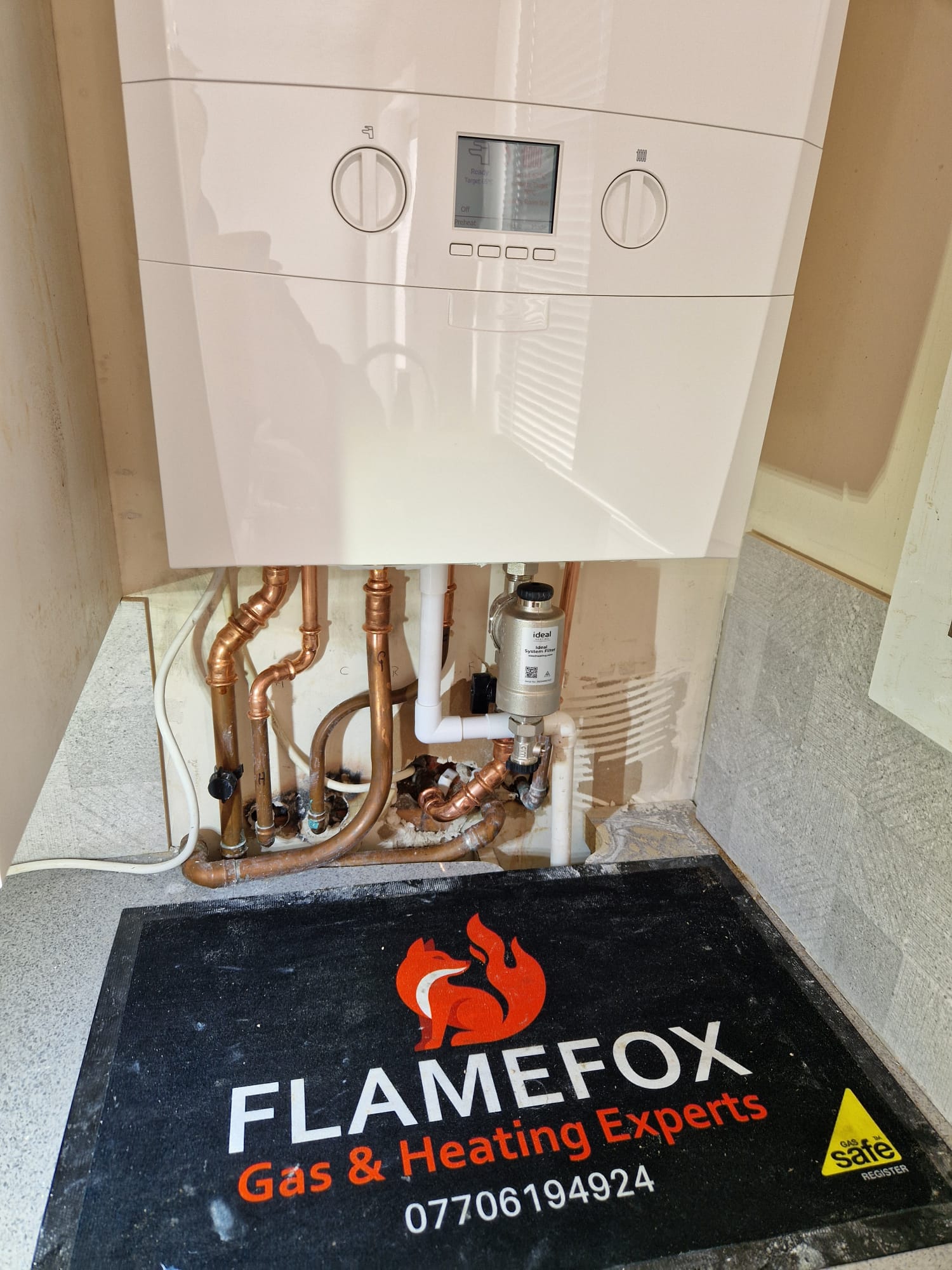 New boiler installation in Glasgow kitchen by Flamefox Gas and Heating Experts engineer